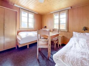 Postel nebo postele na pokoji v ubytování Hotel Alpfrieden