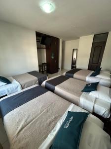 Postel nebo postele na pokoji v ubytování Casa Real