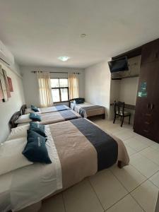 Postel nebo postele na pokoji v ubytování Casa Real