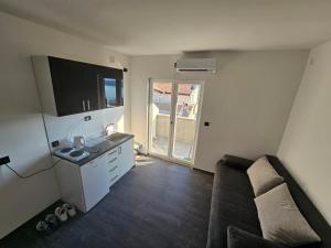 Μια τηλεόραση ή/και κέντρο ψυχαγωγίας στο Studio Apartment