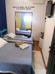 Postel nebo postele na pokoji v ubytování Pousada Estrada Real
