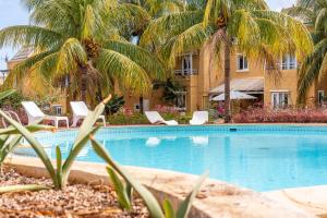 Bazén v ubytování L'Oasis des Vacances nebo v jeho okolí