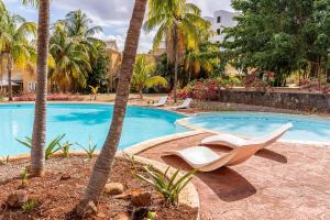 Bazén v ubytování L'Oasis des Vacances nebo v jeho okolí