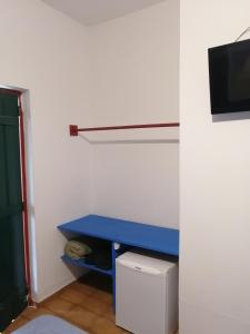 TV a/nebo společenská místnost v ubytování Pousada Estrada Real