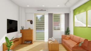 Una sala de estar con un sofá y un televisor. en Private 6BRs 5WC - Heart of District 1, en Ho Chi Minh