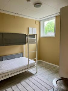 Postel nebo postele na pokoji v ubytování Knôde In