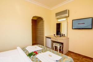 Postel nebo postele na pokoji v ubytování Magic Tulip Hotel