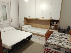 Postel nebo postele na pokoji v ubytování Hotel Fioralba
