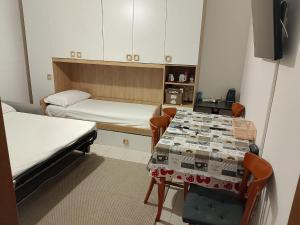 Postel nebo postele na pokoji v ubytování Hotel Fioralba