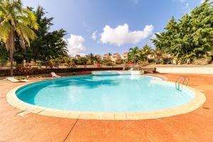 Bazén v ubytování L'Oasis des Vacances nebo v jeho okolí