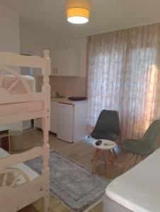 Posteľ alebo postele v izbe v ubytovaní Apartman Hana