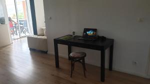 TV in/ali zabaviščno središče v nastanitvi Location vue sur mer à 5 min de la mer