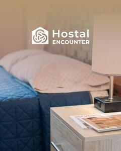 Postel nebo postele na pokoji v ubytování Hostal Encounter Guanajuato