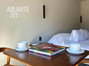 En eller flere senge i et værelse på Altos de la Quebrada II