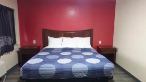 Ένα ή περισσότερα κρεβάτια σε δωμάτιο στο Washington Motel +4 φωτογραφίες