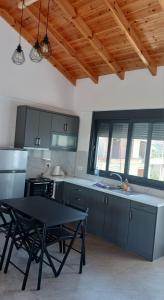 Kuchyň nebo kuchyňský kout v ubytování Vana's Apartments
