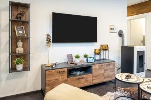 TV a/nebo společenská místnost v ubytování Sky Appartement