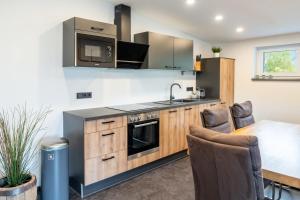 Kuchyň nebo kuchyňský kout v ubytování Sky Appartement