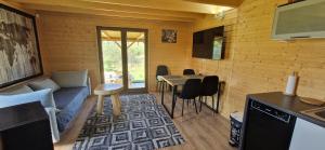 Kuchyň nebo kuchyňský kout v ubytování Domek Wypoczynkowy W Brajnikach + 5 fotografií