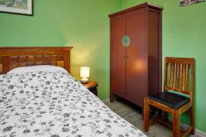 Ένα ή περισσότερα κρεβάτια σε δωμάτιο στο Perła I, Jaworki