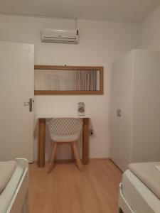 Postel nebo postele na pokoji v ubytování Apartmani Nis