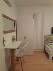 TV a/nebo společenská místnost v ubytování Apartmani Nis