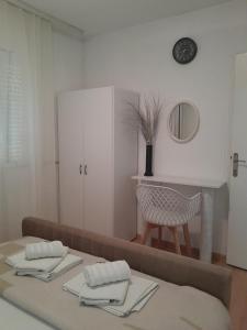 Postel nebo postele na pokoji v ubytování Apartmani Nis