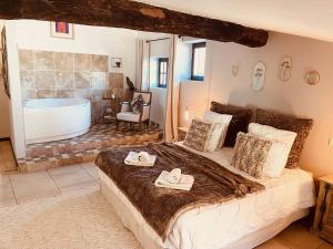 Postel nebo postele na pokoji v ubytování B&B Temps Suspendu Provence