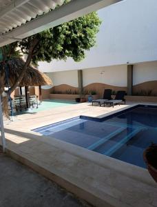 Πισίνα στο ή κοντά στο Casa Macondo Santa Marta