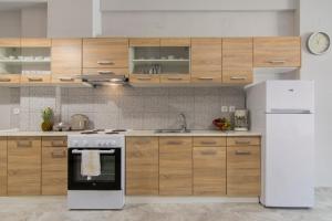 Una cocina o cocineta en Paxos In Square Studio Poseidon
