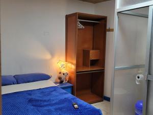 Postel nebo postele na pokoji v ubytování Posada Azul Cusco