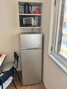 Kuchyň nebo kuchyňský kout v ubytování Apartment Luce