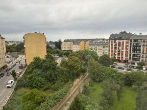 a view of a city with buildings and a street at #Las Azaleas# in Ribadeo