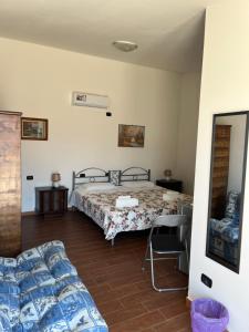 En eller flere senger på et rom på B&B Piandelidei