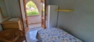 En eller flere senge i et værelse på Spending seaside villa in Cirella, Italy