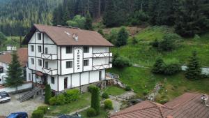 an aerial view of a white house at TRIIBRIA Guest house in Trigrad