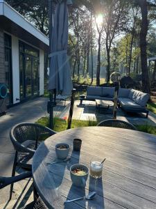 Afbeelding uit fotogalerij van Bos chalet Hellendoorn met Hottub in Haarle