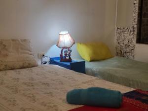 Postel nebo postele na pokoji v ubytování Posada Azul Cusco
