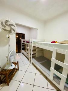 Letto o letti in una camera di Canoa Roots Hostel & Camping