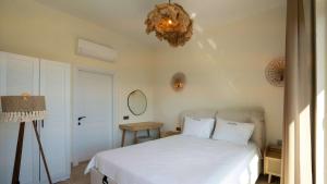 Postel nebo postele na pokoji v ubytování Casa Meis Villas & ESCAPES + 55 fotografií