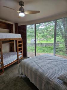 Katil atau katil-katil dalam bilik di Bamboo C House