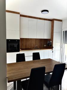 Kuchyň nebo kuchyňský kout v ubytování Tians Apartment