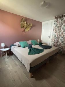 Letto o letti in una camera di Kay Louisette