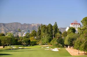 a view of a golf course with mountains in the background at Luxurious Hollywood Home City View - Free Parking 10mins to Universal Studios in Los Angeles