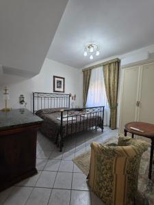 Postel nebo postele na pokoji v ubytování Villa Irene