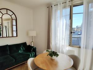 Demeures & Châteaux - Hôtel de la porte Saint-Malo - DINAN的休息区