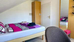 Postel nebo postele na pokoji v ubytování Haus Schanzenblick Fewo10