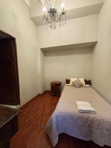Ένα ή περισσότερα κρεβάτια σε δωμάτιο στο Casa Lima