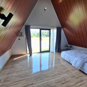 Ένα ή περισσότερα κρεβάτια σε δωμάτιο στο Villa Zaza Durian