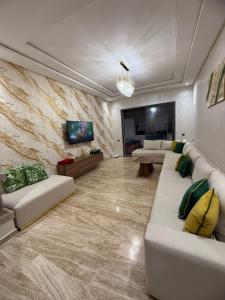 TV a/nebo společenská místnost v ubytování Appartement + 12 fotografií